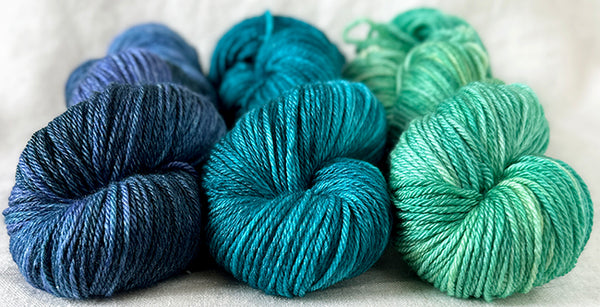 Out of the Doldrums <br>fine DK silky merino <br>2 skeins teal left!